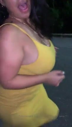 Drunk Latina woman gets naked in the street