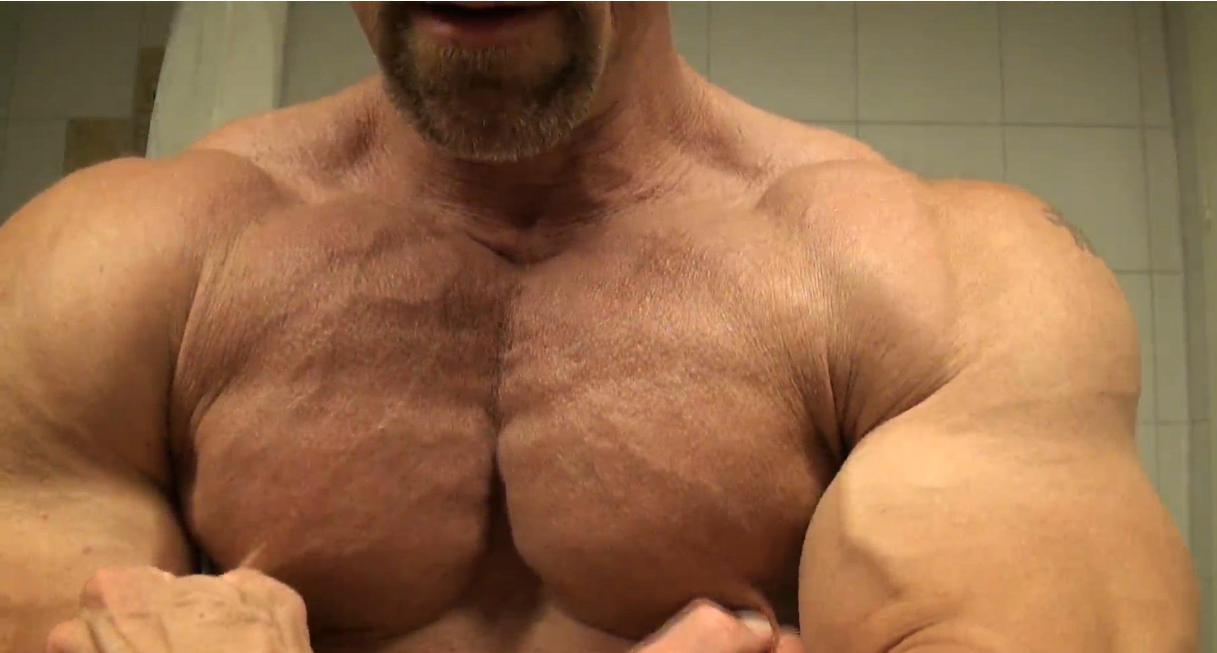 Muscle Daddy Plays with his nipples and pecs