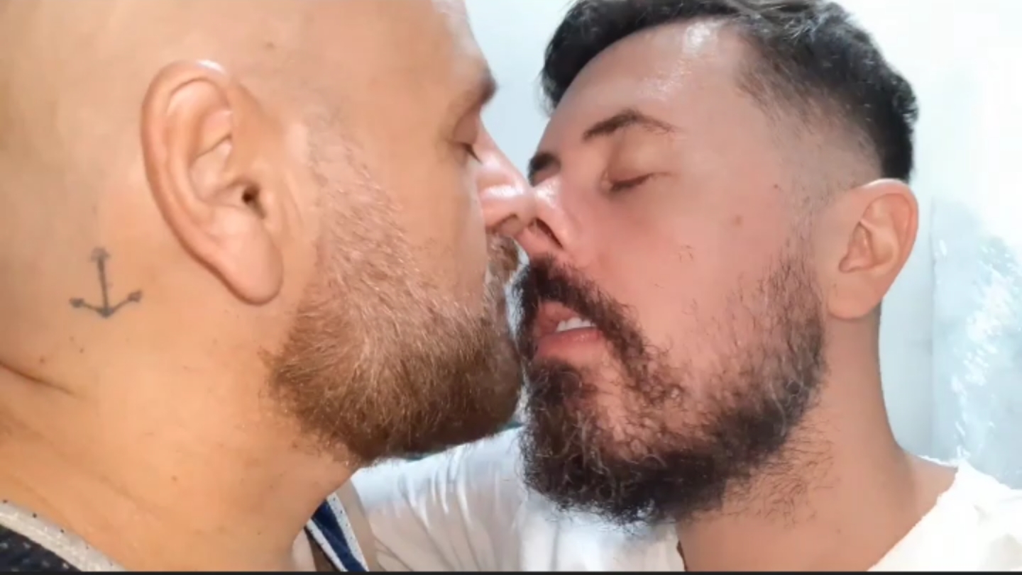 Two Men rubbing and playing with their noses