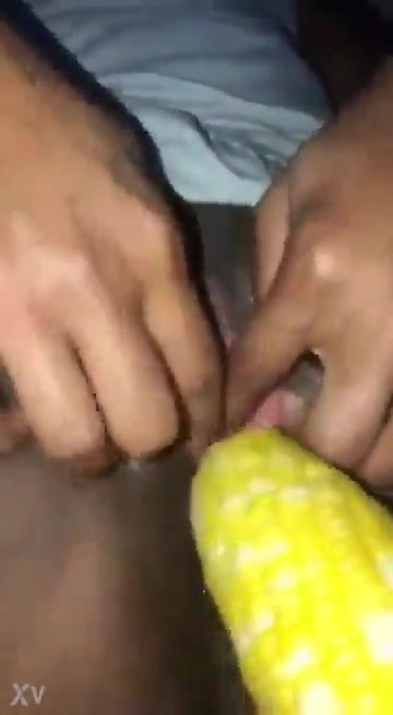 Bizarre: ebony takes ear of corn in the pussy
