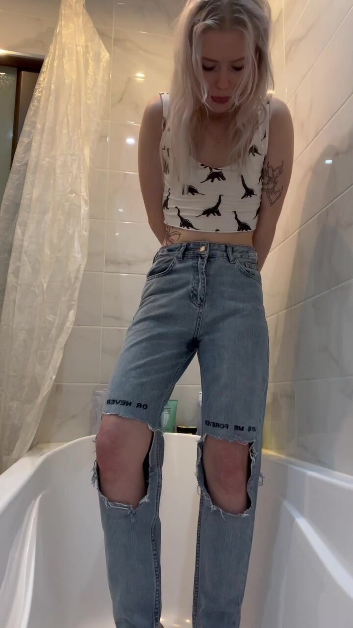 Desperately wetting her jeans - video 2