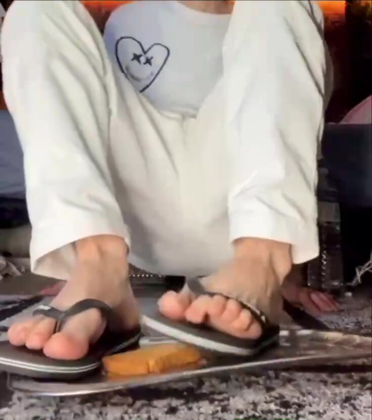 Boy crushes biscuits with flipflops