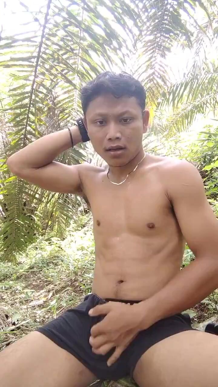 Sexy boy jerking outdoors