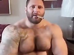 Cigar daddy shows off big muscle