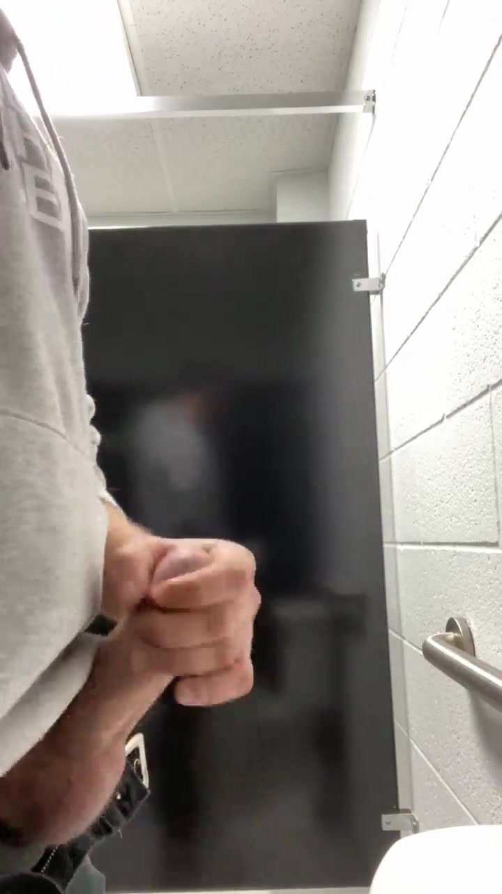 cumming on public restroom wall