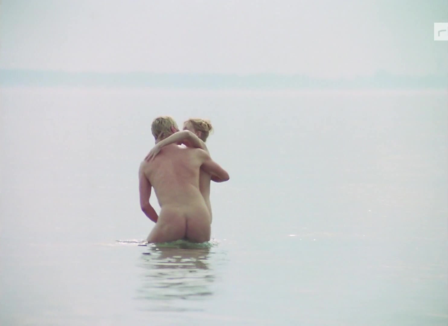 BLOND GERMAN CARRIES A WOMAN FROM THE SEA
