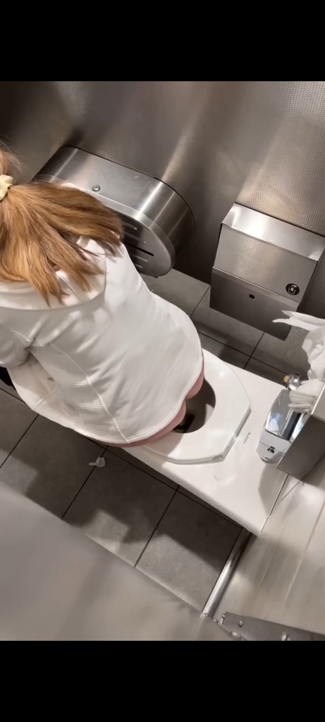 Woman grunts while pooping