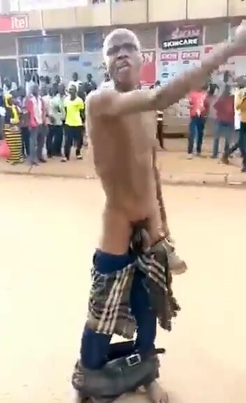African man cock out flashing in public