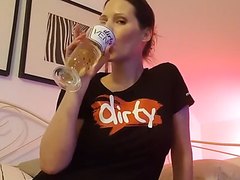 Dirty girl fills glass with piss and drinks all