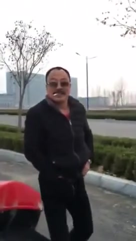 Chinese Man Pissing in Public