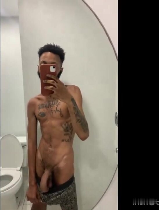 skinny tatted-up young bul flashing his big dick
