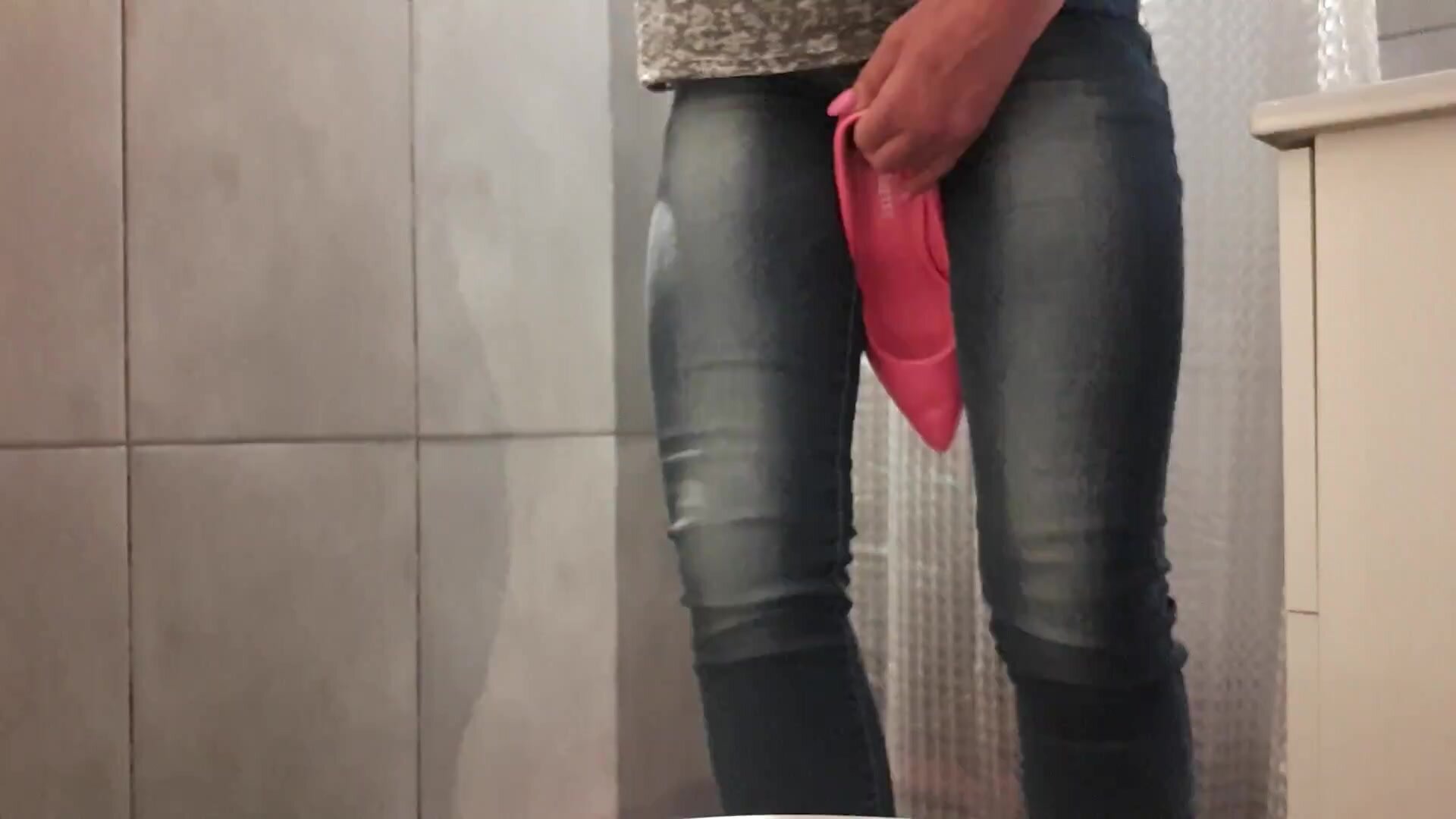 girl wetting jeans with high heel