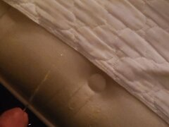 Pissing on hotel bed sheets