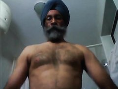 Mature Sikh man jacking