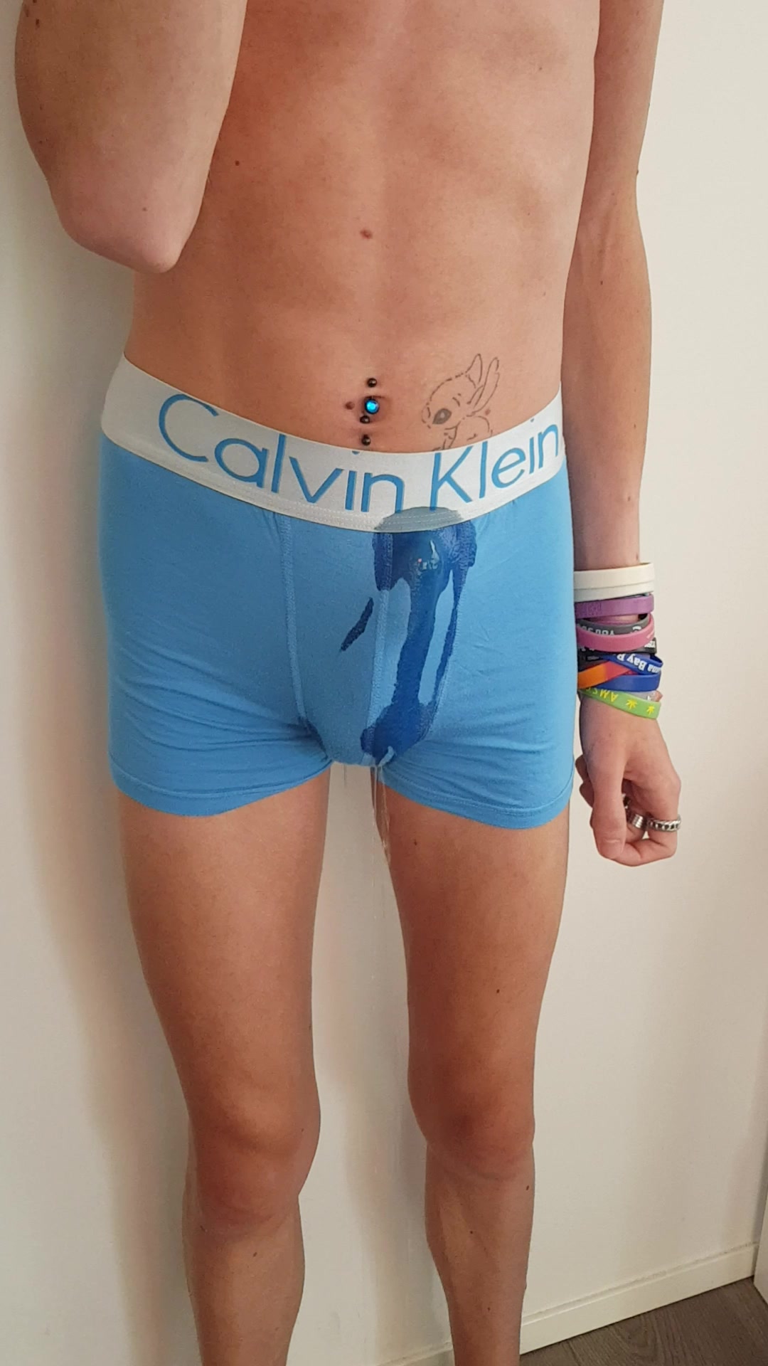 Pissing blue boxers