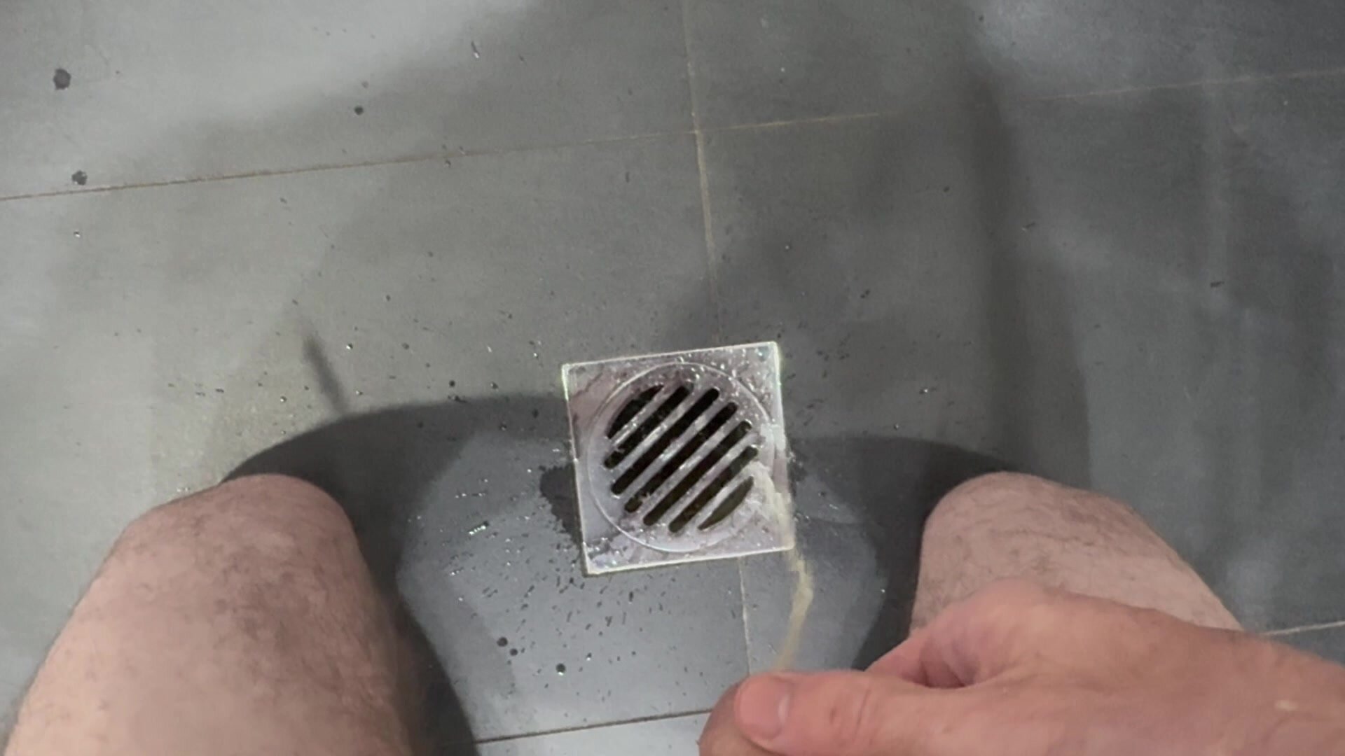 Pissing in toilet floor drain and in toilet