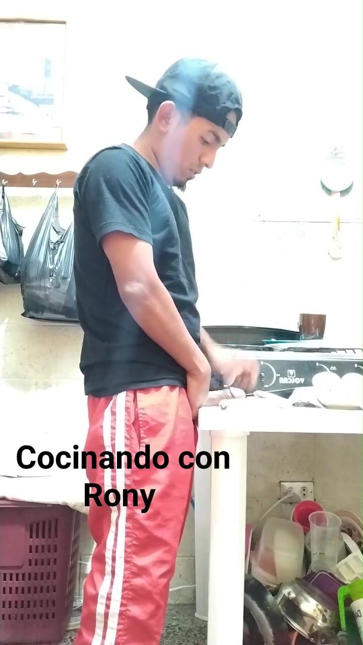 Horny latín guy cooks with his dick Part one