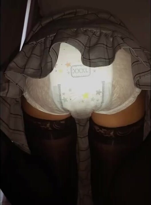 Japanese girl messing pampers