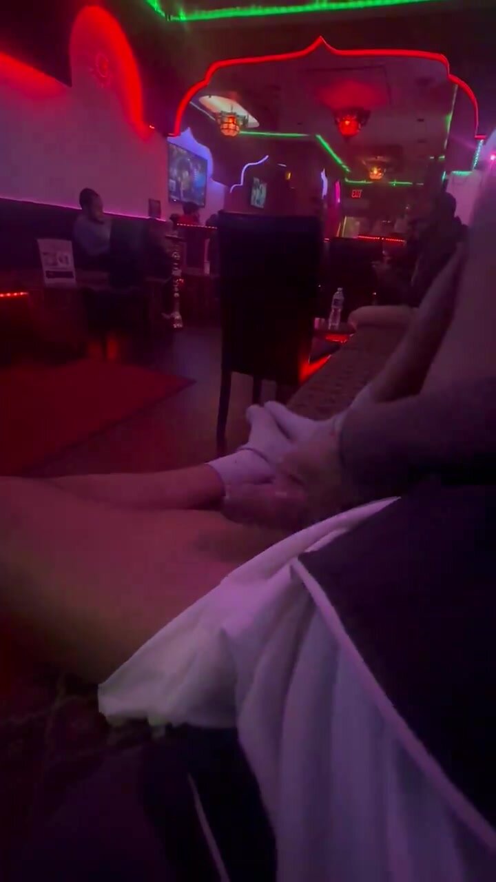 Jerk off with open legs, presenting to audience in cafe