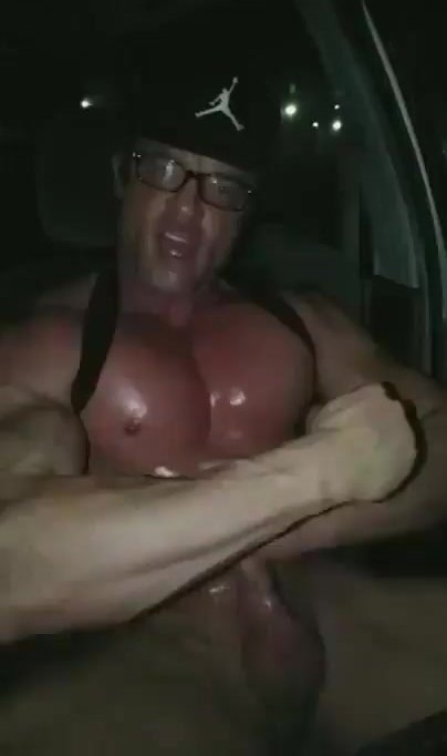 muscle guy jerking off in his car