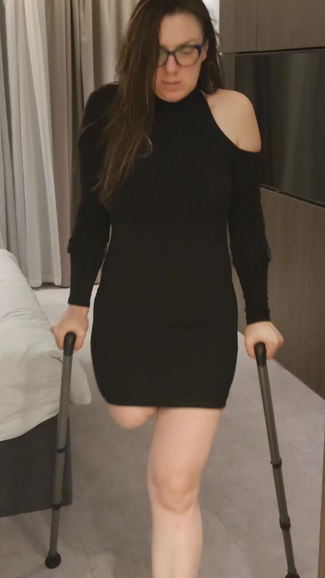 Amputee girl in crutches - video 3