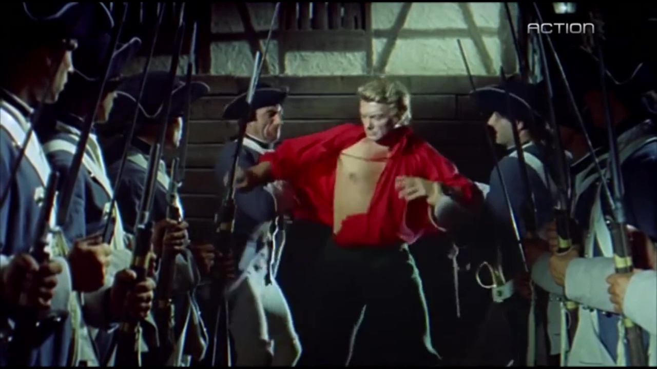 Whipping, shirt rip: King on Horseback (1958)