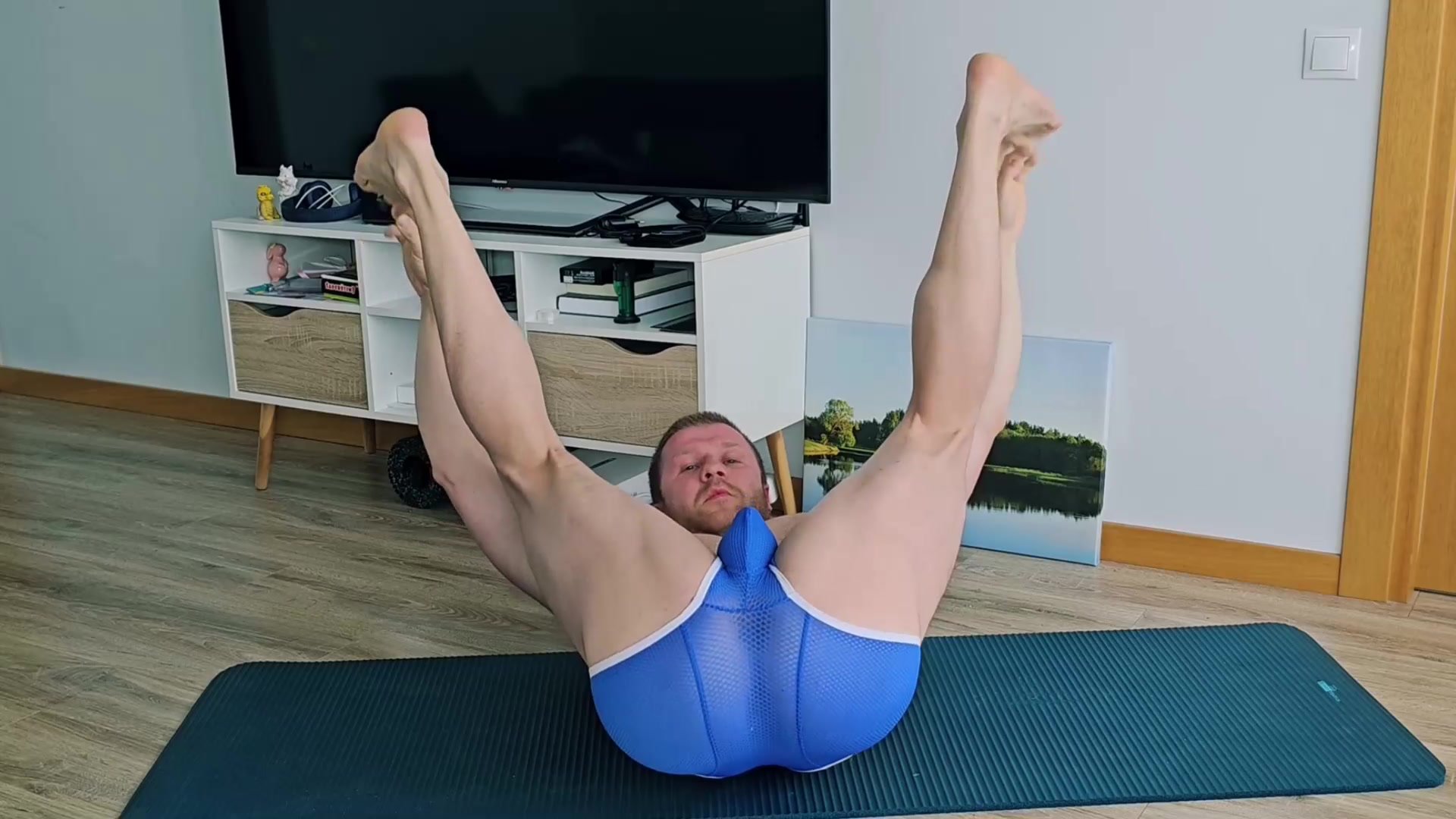 Man doing yoga shows his hole through sheer underwear