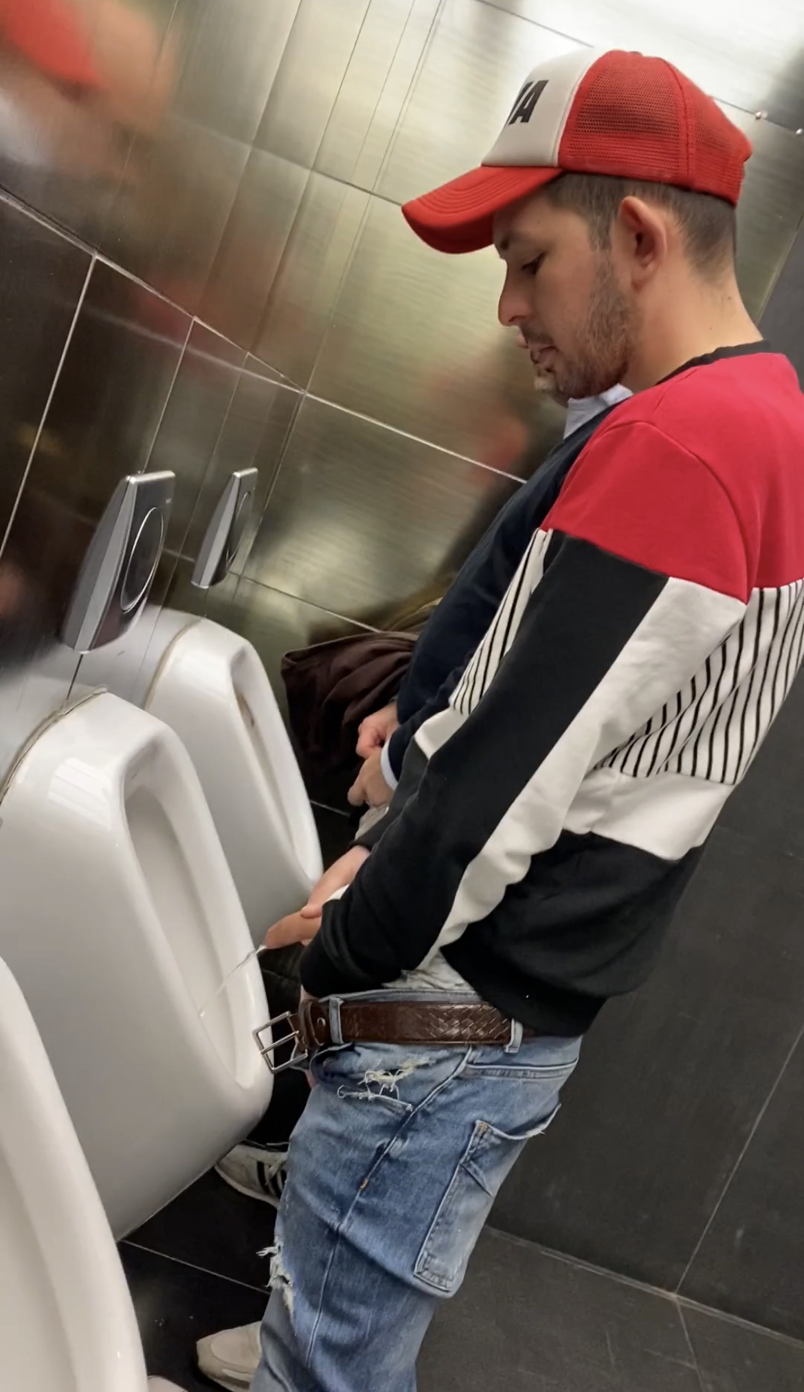 HANDSOME GUY AT THE URINALS