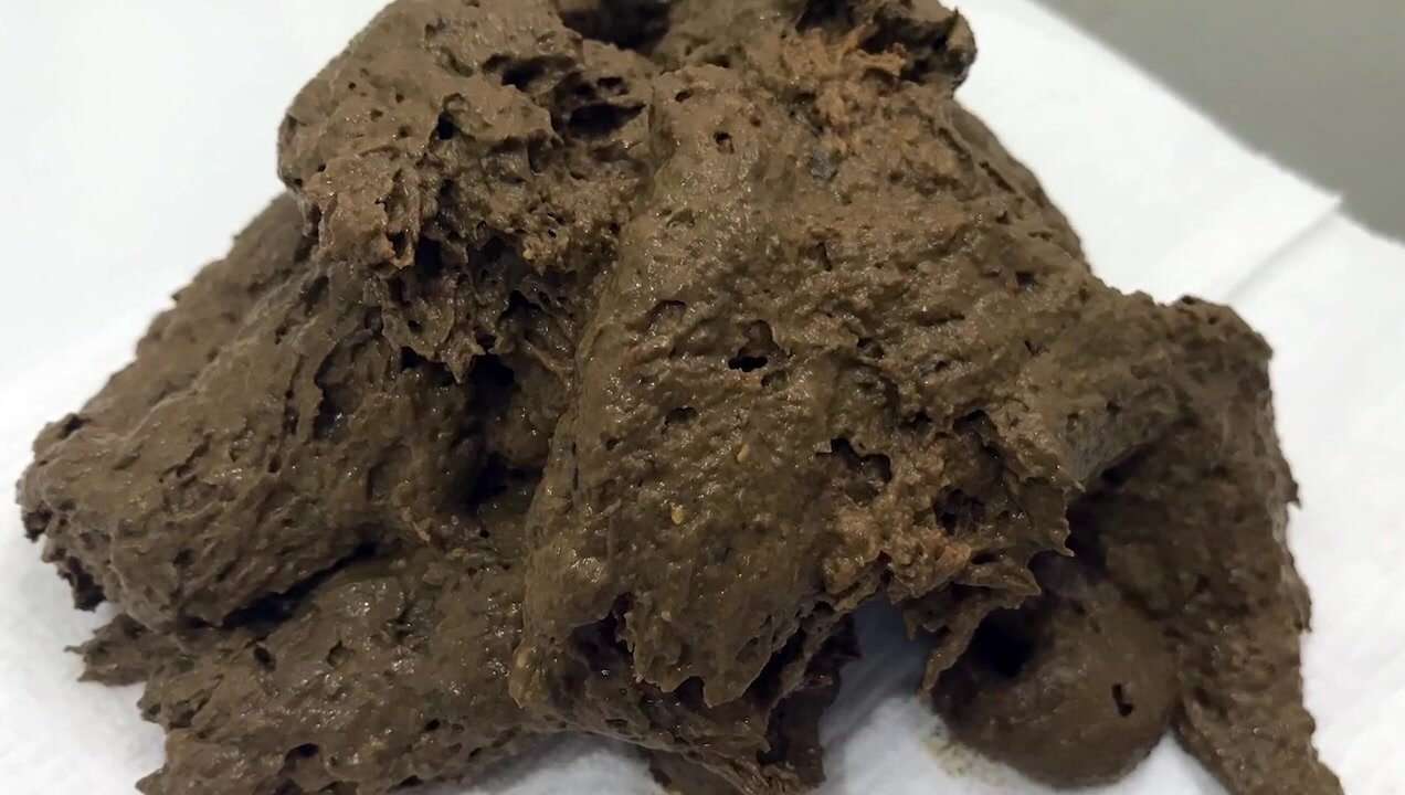 Tranny produces a pile of poo..