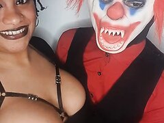 Busty Ebony Sucking Clown Cock