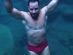 Brazilian hottie barefaced underwater in bulging speedo - video 5