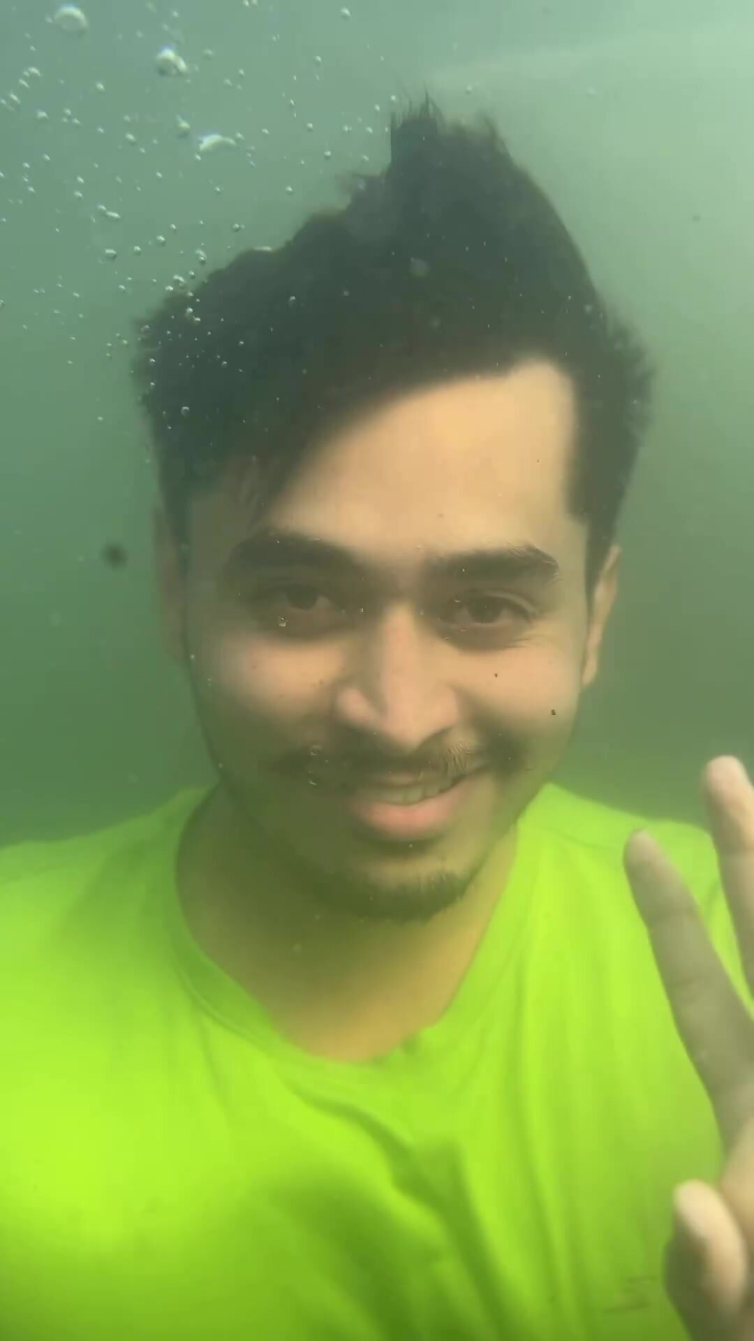 Cute indian barefaced underwater - video 2