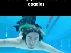 Swiss merman barefaced underwater in pool