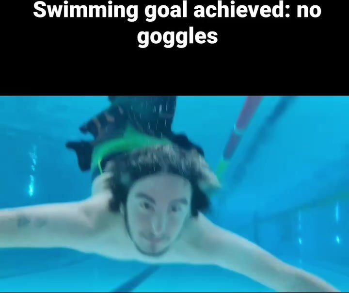 Swiss merman barefaced underwater in pool