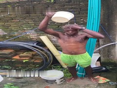 sexy african outdoor bathing with a big bulge