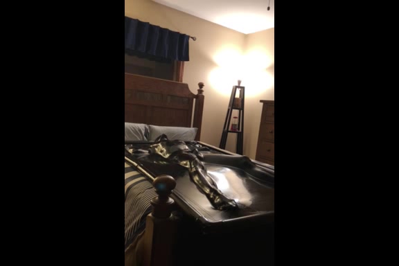 young guy struggling in vacuum bed