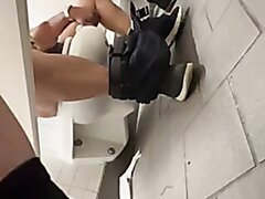 Latino Caught Jerking in Busy Airport Mensroom