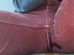 Wetting her red pants