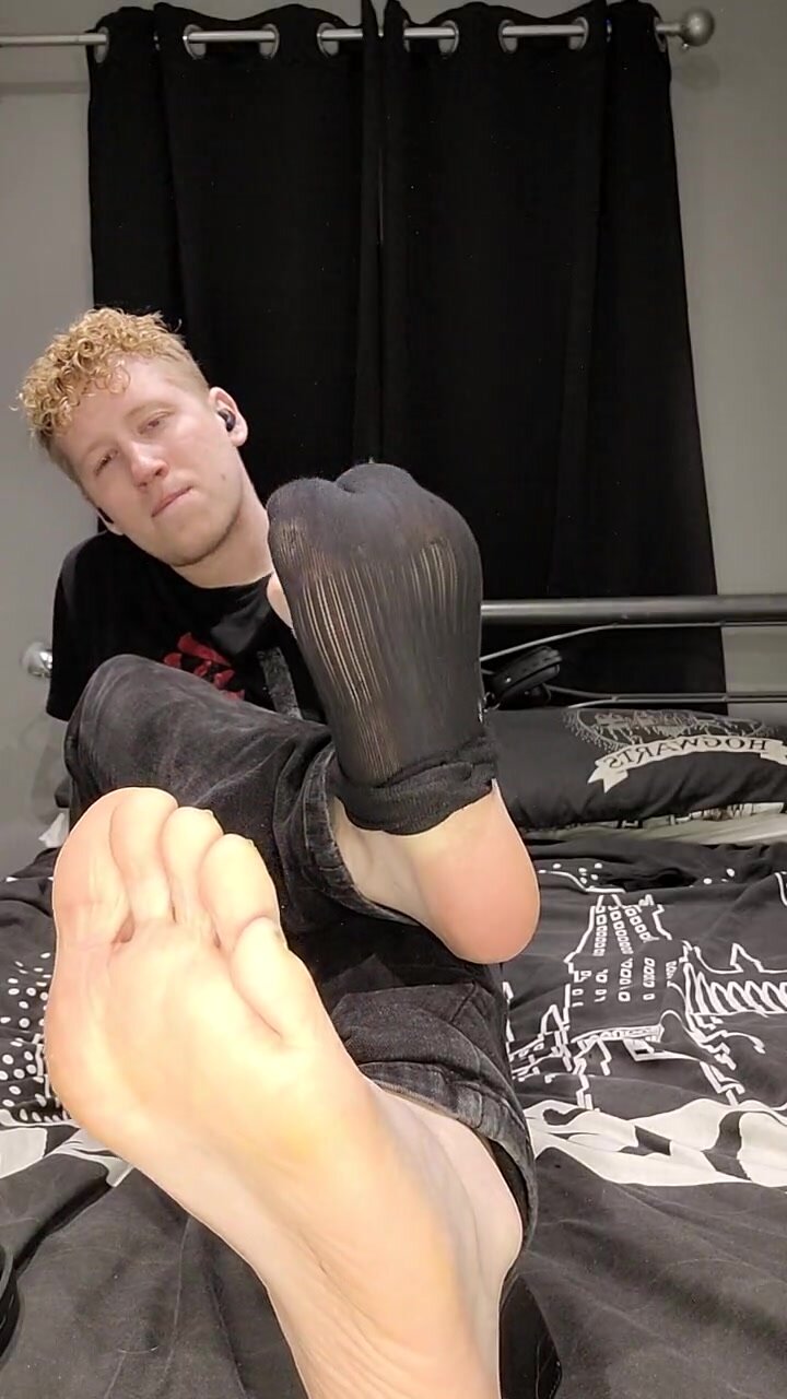 Master shows his sweaty socks and takes them off