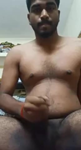 Handsome indian boy strips and shows everything