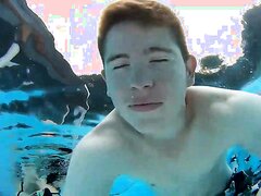 German guys barefaced underwater in pool