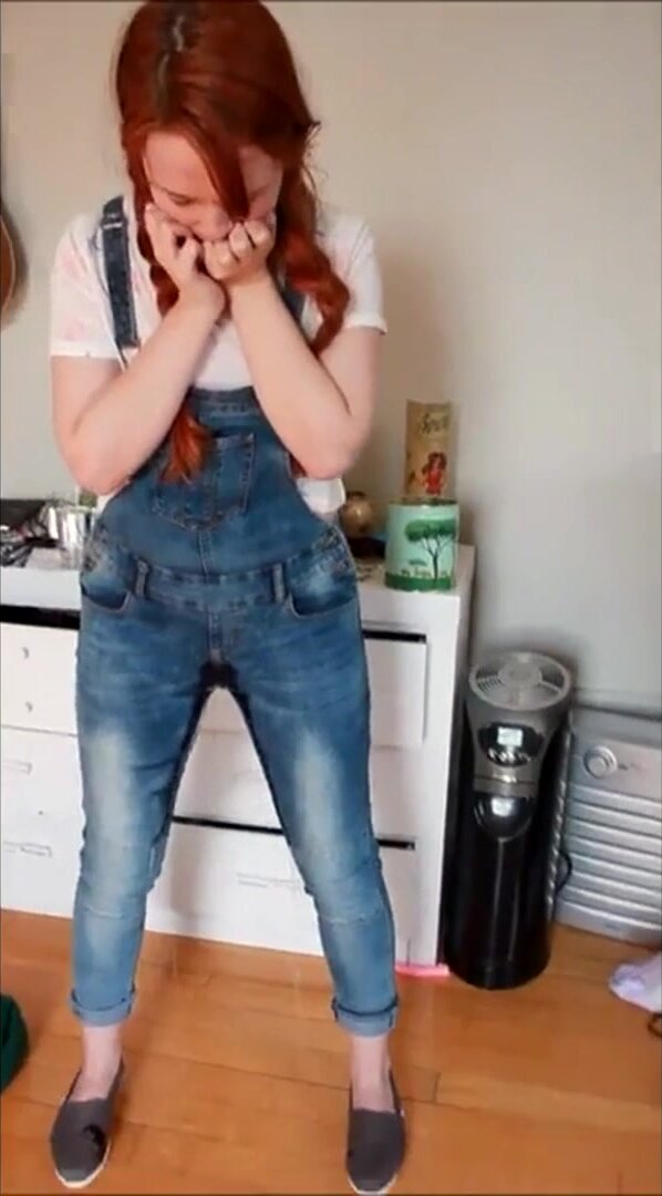 Redhead pisses her dungarees