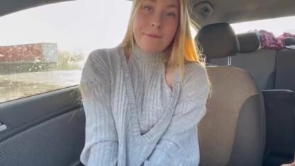 Cute girl masturbates in car