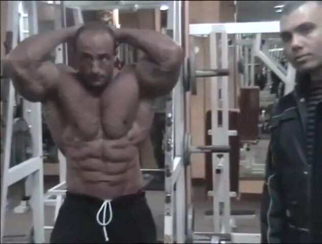 Handsome Arab Bodybuilder flexes