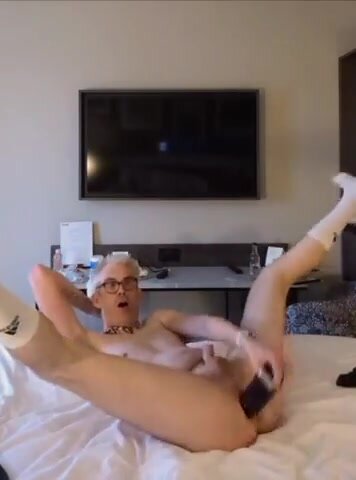 Dumb Faggot using dildo in hotel room