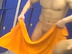 College jock towels off in locker room