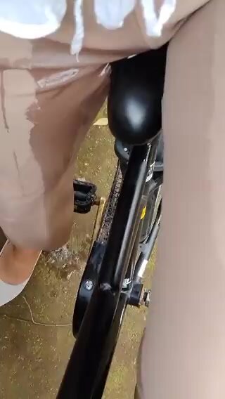 Japanese Girl pees herself while on her bike