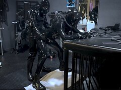 Two Rubber Gimp Fucking