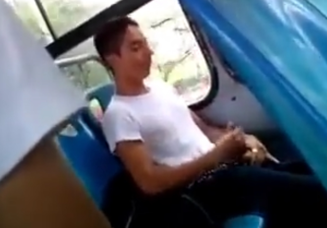 Young boy jerk in public bus