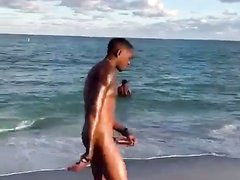 Straight Black man with enormous dick on nude beach